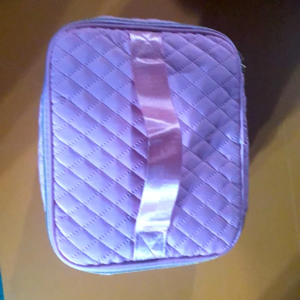 Pink quilted manicure and cosmetics bag